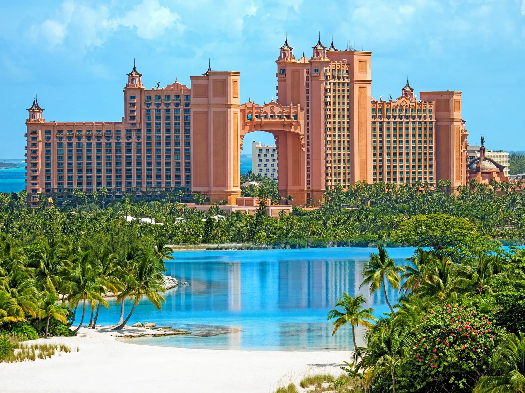 Oceanfront coral royal towers of Atlantis Paradise Island above azure lagoons